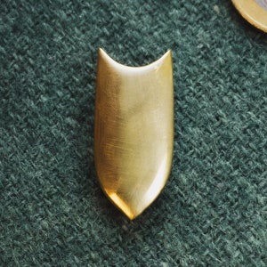 A belt end for the thin belts 1cm. Reenactment of a European costume of the 14th-15th century.