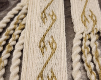White tablet woven wool belt. Dragon heads. Viking reenactment. Inspiration from the brocaded belt, Dublin, 10th century. 24 tablet cards.