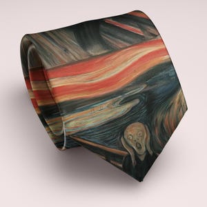 May include: A rolled necktie featuring a print of Edvard Munch's iconic painting, "The Scream." The tie showcases the artwork's swirling sky in shades of red, orange, and blue, with the central figure's expression of anguish.