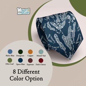 May include: A dark blue necktie featuring a white line-art pattern of various lake shapes. The image includes a logo for Rabbit Patch Gifts and a color chart displaying eight options: Baltic Blue, Evergreen, Copper, Muted Teal, Olive Leaf, Space Blue, Espresso, and Dark Cherry, with the text 8 Different Color Option.