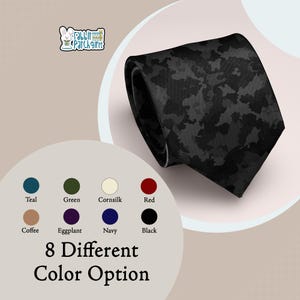 May include: A black necktie featuring a dark camouflage pattern. The image includes the text Rabbit Patch Gifts and a color chart displaying eight options: teal, green, cornsilk, red, coffee, eggplant, navy, and black, with the text 8 Different Color Option.
