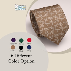 May include: A brown tie with a repeating white satellite pattern. The tie is folded and angled, showcasing the design. The image also displays a color palette with six options and the text "6 Different Color Option".