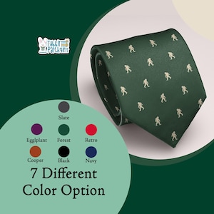 May include: A forest green tie with a repeating pattern of beige Bigfoot figures. The image also shows a color chart with seven different color options, including slate, eggplant, forest, retro, cooper, black, and navy.