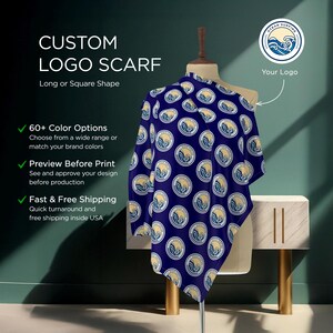 May include: A blue and yellow custom logo scarf with a repeating pattern of a wave logo. The scarf is displayed on a mannequin and can be customized with 60+ color options. The text "Ocean Surfing" is inside the wave logo. The text "Your Logo" is above the scarf.
