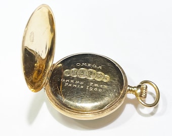 Reloj de bolsillo Omega Grand Prix París 1900 de oro amarillo de