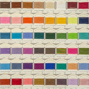 May include: A grid of spools of linen thread in a variety of colors, including brown, pink, orange, yellow, blue, green, purple, and red. Each spool is labeled with text.