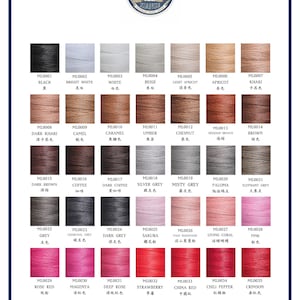 May include: A color chart of 35 different thread colors, labeled with their corresponding color names and codes. The thread colors range from black to white, brown to pink, and red to grey. The chart is organized in rows and columns, with each color displayed in a small spool.