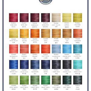 May include: A color chart of 70 different thread colors, with each color labeled with a number and a name in both English and Chinese. The colors are arranged in rows and columns, and the chart is bordered in black.