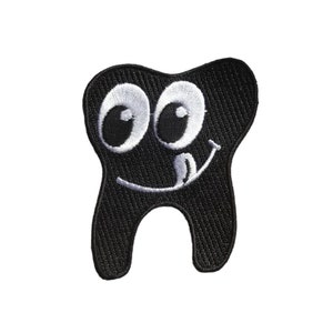 May include: Black embroidered patch of a tooth with a smiling face and googly eyes.