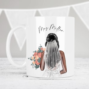 May include: White ceramic mug with a black and white illustration of a bride holding a bouquet of orange and pink flowers. The text "Mrs. Miller" is printed on the mug.