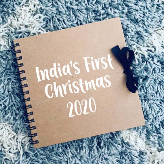 personalised first christmas book