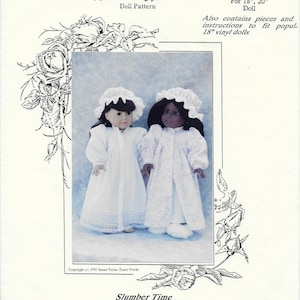 May include: A sewing pattern envelope titled Fancy Frocks Doll Pattern for 18 inch and 20 inch dolls. The cover features two dolls wearing white nightgowns and matching bonnets. The text includes Slumber Time 2042 - 18 inch and 20 inch.