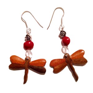 Wooden pendant earrings in the shape of dragonfly, glass and natural seeds