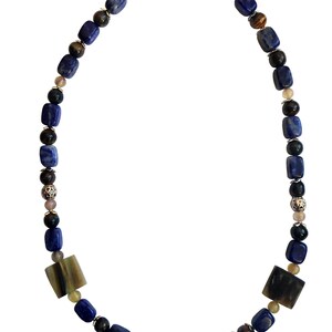 Necklace of sodalite, citrino quartz, hawk&#39;s eye, silver and bone inserts.
