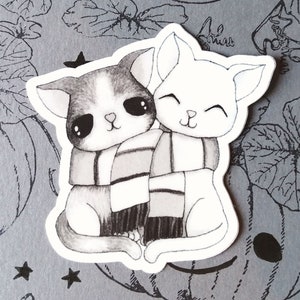 Cuddling Cats