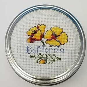 Cross stitched mason jars lids (wide mouthed)