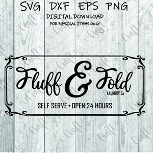 May include: Black and white sign with a decorative border that says "Fluff & Fold Laundry Co. Self Serve - Open 24 Hours".