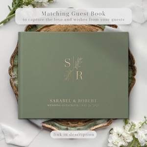 Minimalist personalized guest book displayed in a styled flat lay with a soft sage-green hardcover and elegant gold foil monogram, placed on a decorative tray with light florals and neutral textures. Designed to collect heartfelt messages and signatures, this wedding guest book suits classic and modern celebrations alike. A refined keepsake for a wedding ceremony, anniversary gift, or custom wedding album, featuring timeless design, premium materials, and an elegant, understated aesthetic.