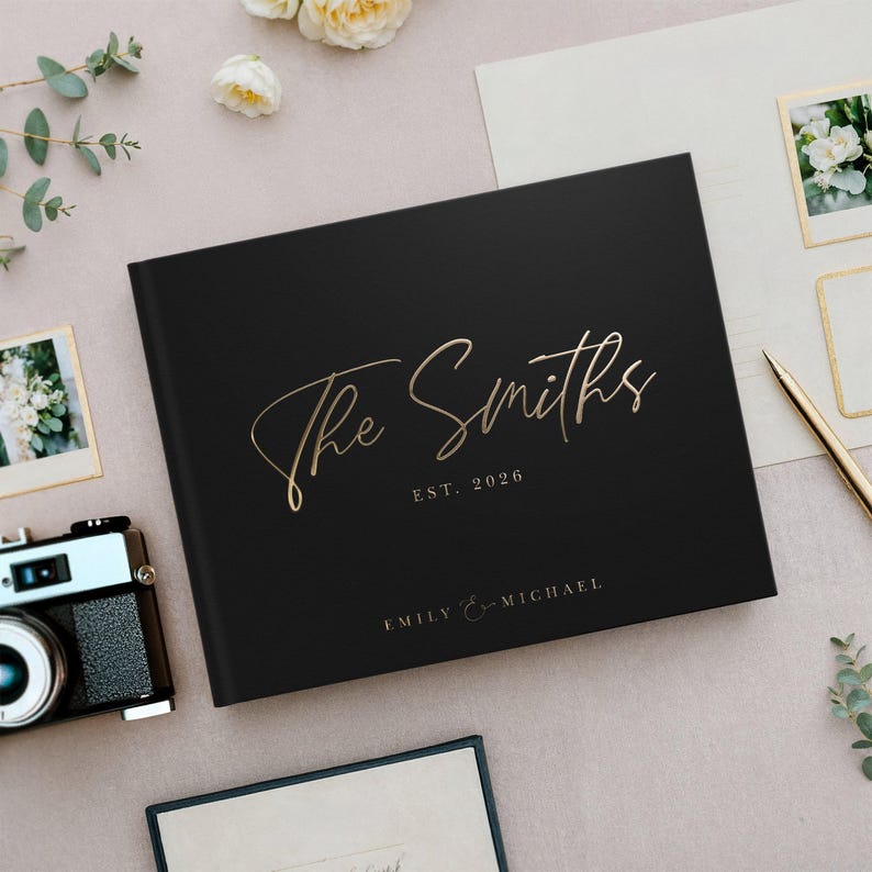 Custom black wedding guest book in elegant black with gold foil, designed as a timeless keepsake for classic weddings, receptions, and anniversary celebrations. This custom wedding album offers space for guests to sign and leave wishes, serving as both a memory book and a beautiful display piece. Perfect as a custom wedding gift, anniversary gift, or elegant wedding accessory, with a minimalist yet luxurious design that suits boho, traditional, and modern wedding themes.
