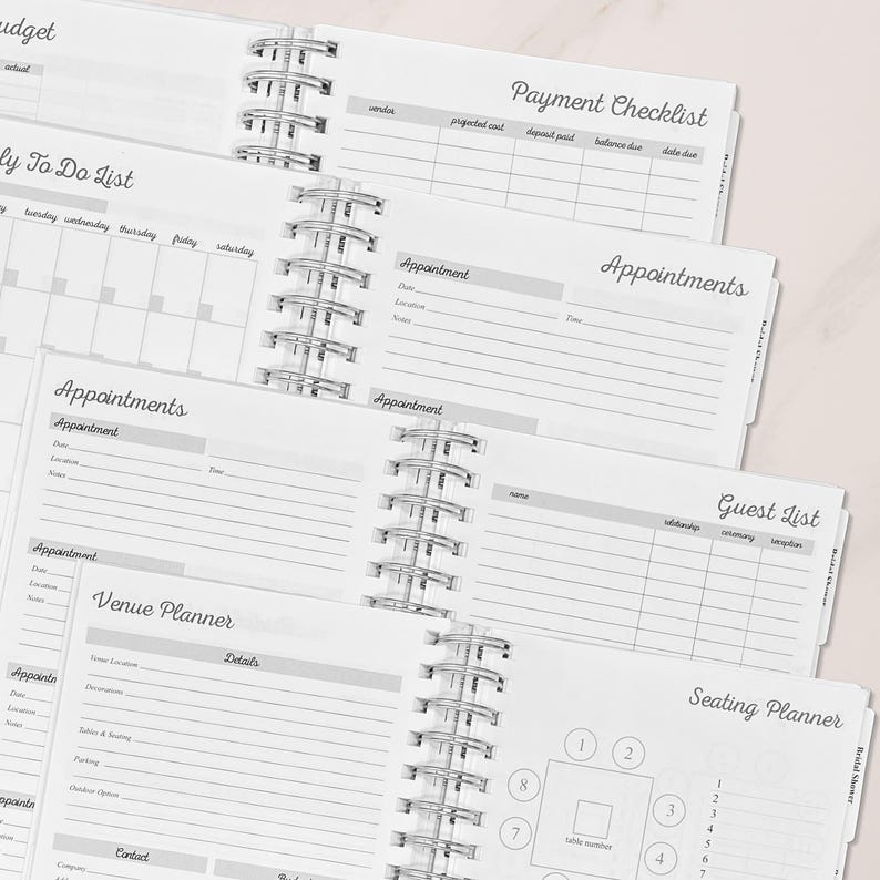 Wedding planner book with detailed pages for budget tracking, payment checklist, appointments, guest list, venue planning, and seating arrangements. A perfect tool for organizing a wedding. Ideal bridal shower or engagement gift.