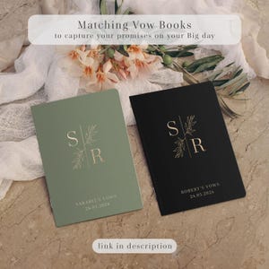 Elegant set of wedding vow books arranged in a styled flat lay, featuring two minimalist hardcovers in sage green and classic black with refined gold foil detailing. Designed for exchanging heartfelt promises, these vow books are perfect for a wedding ceremony or vow renewal. A timeless keepsake for couples, ideal as personalized wedding vow books, his and hers vow book set, or a meaningful engagement or bridal shower gift, blending modern, minimalist, and elegant design.