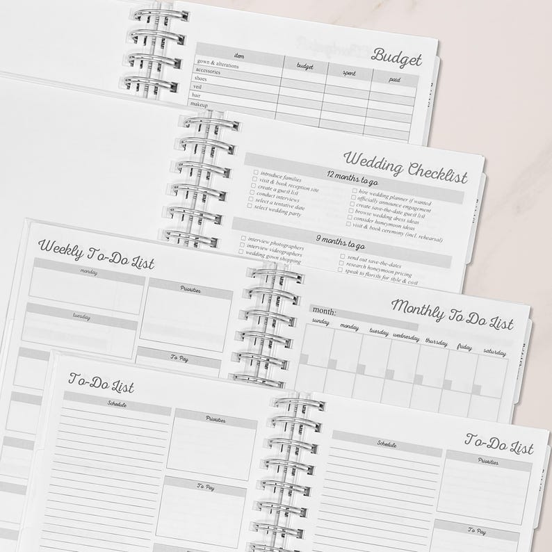 Wedding planner book with detailed pages for budgeting, wedding checklists, weekly and monthly to-do lists. A perfect tool for organizing every detail of the big day. Ideal for brides-to-be, a bridal shower gift, or an engagement present.