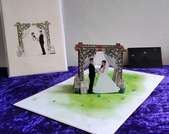 Carte de vœux pop-up Kirigami 3D pour les mariés sous l'arc de mariage
