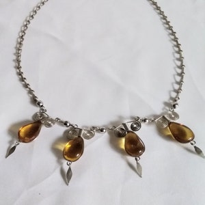 Orange Transparent Glass Necklace with metal Decorations