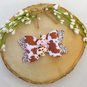Cowhide Bow with Cow Clay Center, Cow Print Bow, Bows for Babies, Large Bow, Faux Leather Bows, Cowhide Bow, Farm Bow, Western Bow, 4 inches