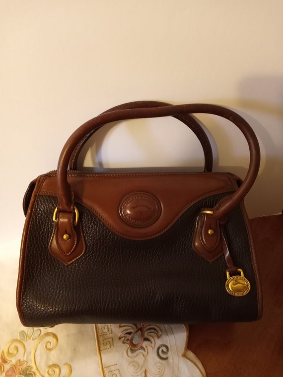 dooney and bourke saddle bolsa vintage