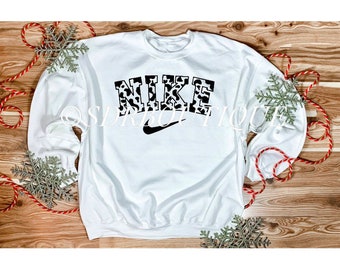 nike cow sweater