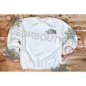 nike cow print crewneck