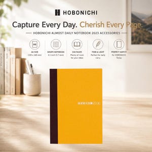 May include: A Hobonichi A6 graph notebook with a bright yellow cover and a dark brown spine. The text on the cover reads in Japanese characters. The notebook features 240 pages, measures 105 x 148 mm, and is designed for daily carry.
