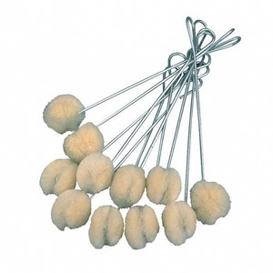 May include: A collection of ten cleaning swabs. Each swab has a light beige, fluffy head attached to a long, thin, silver metal handle. The handles are looped at the top. The swabs are fanned out against a white backdrop.