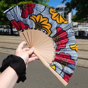 Wooden and wax cotton fan
