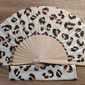 Wooden and wax cotton / coated cotton fan