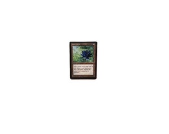 May include: A Magic: The Gathering card titled "Black Lotus." The card features a dark blue lotus flower illustration against a green background. The card's text is in English, with a brown border and a tan background.