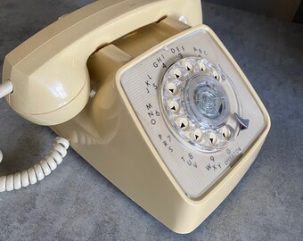 Vintage Yellow GTE Rotary Phone