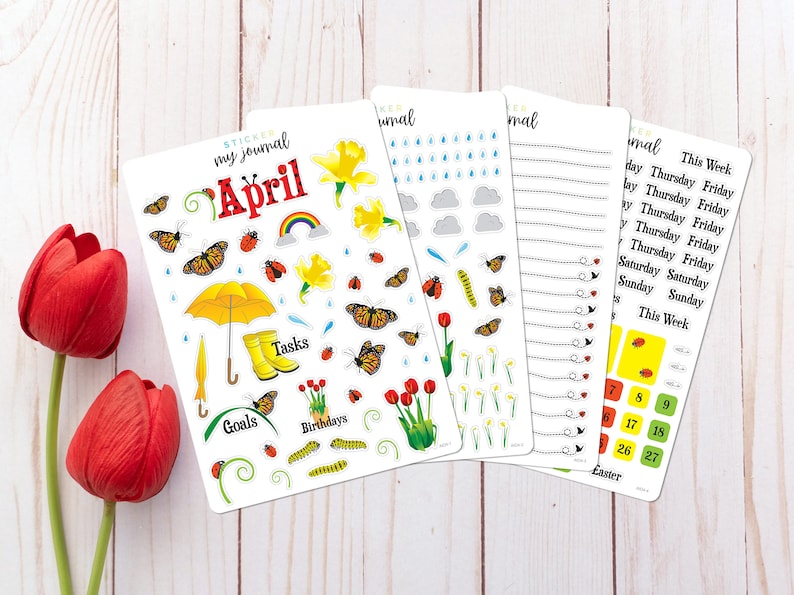 A set of four sticker sheets for a journal. The stickers feature a variety of spring-themed designs, including flowers, butterflies, ladybugs, rain clouds, raindrops, umbrellas, and a rainbow. The stickers are labeled with the words 'April', 'Tasks', 'Goals', and 'Birthdays'. Includes days of the week stickers and date dots for a full month. Primary color theme is red and yellow with bright green. The sheets are designed for use in a journal or planner.