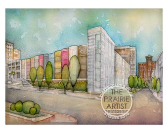 Puede incluir: Pintura a la acuarela de una calle de la ciudad con una fila de grandes lomos de libros coloridos que forman una fachada de edificio. Se ven árboles y otros edificios. El cielo es azul claro y la obra está firmada por "The Prairie Artist" en Etsy.