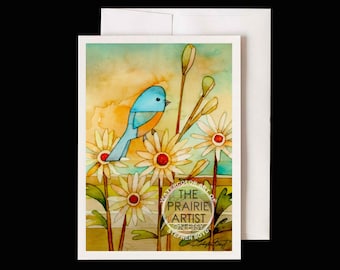 Könnte beinhalten: Aquarell-Grußkarte mit einem blau-orangen Vogel, der zwischen weißen Gänseblümchen mit roten Zentren sitzt. Die Karte hat einen weißen Rand und einen passenden Umschlag. The Prairie Artist by Stephen Boyd ist auf der Karte aufgedruckt.