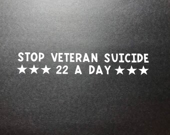 May include: Black background with white text that reads "STOP VETERAN SUICIDE 22 A DAY" with five white stars on each side of the text.