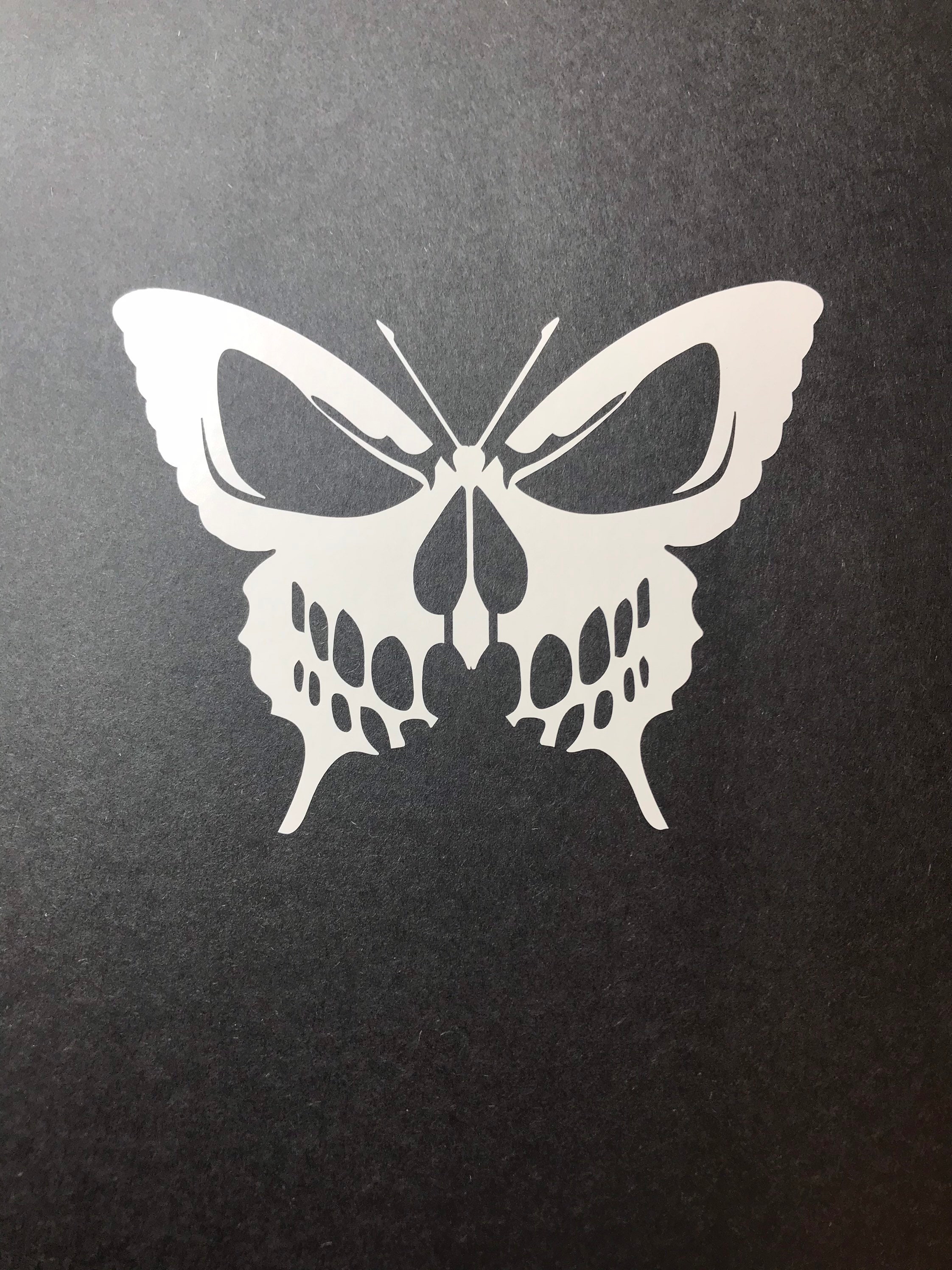 Skull face butterfly decal
