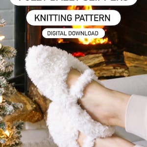 May include: White fuzzy ballet slippers. The image includes text that reads "FUZZY BALET SLIPPERS", "KNITTING PATTERN", and "DIGITAL DOWNLOAD". The slippers are soft and fluffy, perfect for lounging. The background shows a fireplace with a warm fire.