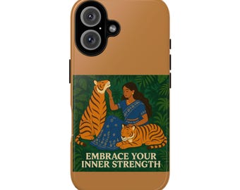 May include: A phone case with a brown background and a green and white illustration. The illustration depicts a woman in a blue dress with two tigers and the text "EMBRACE YOUR INNER STRENGTH".