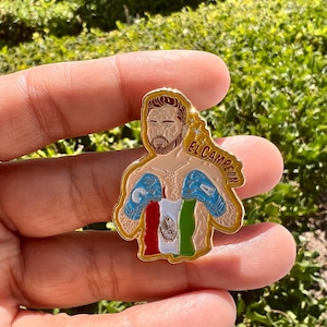 El campeon enamel Pin