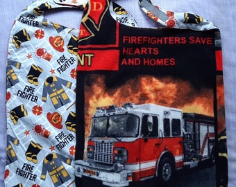 Reversible Large Adult or Handicapped Clothes Protectors: Fire Fighter Gear on flannel with Firetrucks, etc. on fleece on the other side.