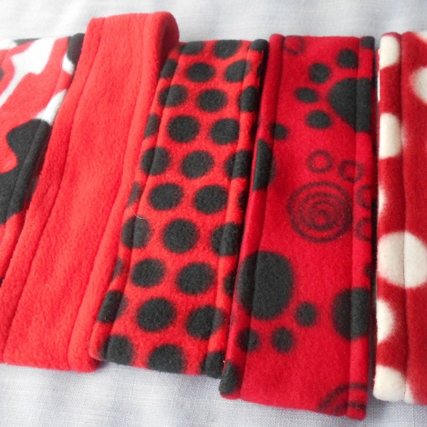 Red Headbands Includes: Red, Red/Black/White Camouflage, Red with Dots and Red with paw Prints.