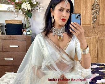 Gebroken witte sari van organzazijde: gespiegelde rand, taft blouse