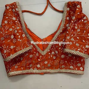 Orange Embroidered Saree Blouse: Bollywood Party Wear Choli